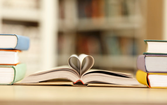 Open book with pages in heart shape