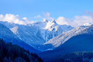 Fototapeta na wymiar Two Snow Mountains Vancouver British Columbia Pacific Northwest.