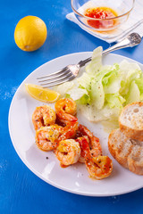 Grilled tiger shrimps in spices, sweet and sour sauce
