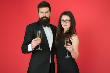Family celebrate Valentines day. Romantic relationship. Love concept. Celebrating their love. Occasion to celebrate. Couple in love drink sparkling wine. Attractive woman bearded man raise glasses