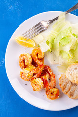 Grilled tiger shrimps in spices, sweet and sour sauce