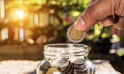 Put the coin into the bottle. Saving