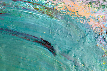 Background image of bright oil-paint palette closeup.