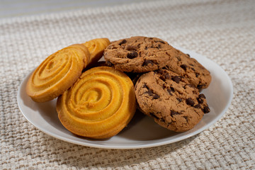 cookies on a white plate on a light background 