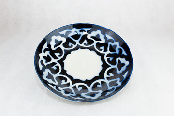 White plate with east traditional ornament