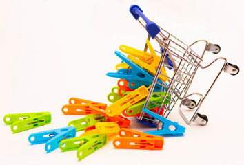 linen clips fell out of a wheeled basket that tripped