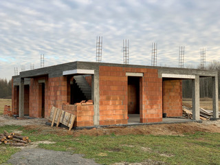 Family brick house under construction