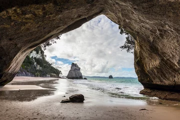 Wall murals Cathedral Cove Woman tourist taking pictures of beach