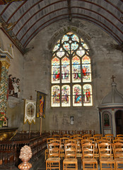 Obraz premium Enclos paroissial de Pleyben dans le Finistère en Bretagne son église et ses magnifiques vitraux, sa porte triomphale et son ossuaire
