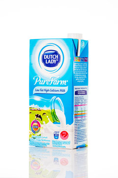 KUALA LUMPUR,MALAYSIA - FEBRUARY 16,2020 : A pack of Dutch Lady Pure Farm low fat UHT milk on white background.