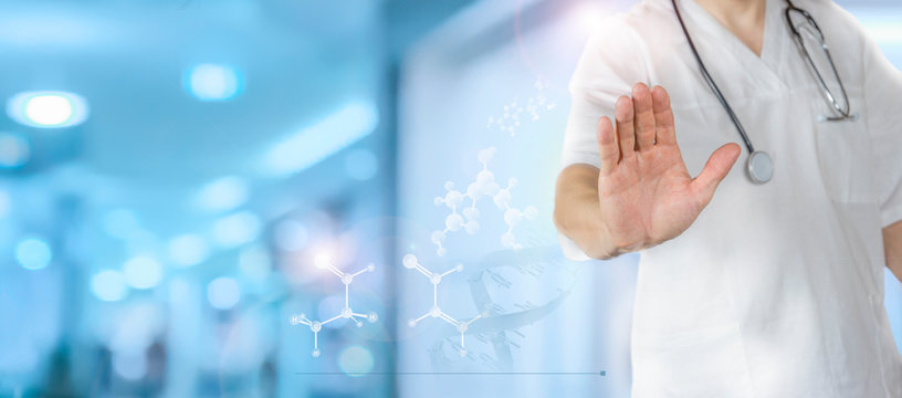 The doctor shows a stop gesture. DNA. Digital healthcare, modern virtual screen interface, medical technology and network concept.