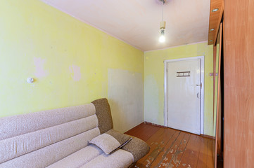 Russia, Moscow- October 17, 2019: interior room apartment decrepit old sloppy non modern setting. cosmetic repairs required