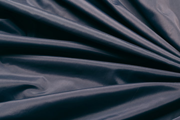 Blue fabric cloth texture. abstract texture background with soft waves.