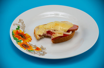 Hot bread on a plate with a blue background