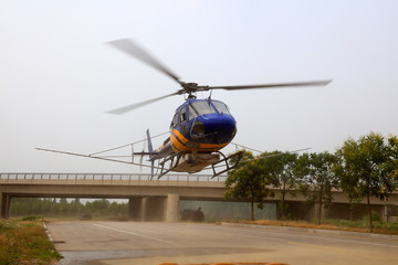 Agricultural helicopters take off to spray pesticides, Luannan County, Hebei Province, China