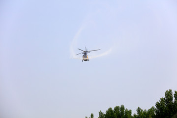 Helicopters Spray Pesticides in the Air