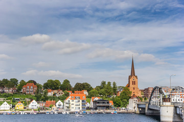 Bridge, church tower and houses at the quay of Sonderborg, Denmark