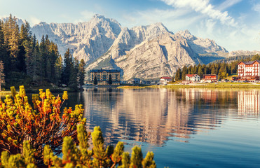 Beautiful Summer sunny landscape. Wonderful view on Misurina Alpine lake in morning. National Park Tre Cime di Lavaredo, Auronzo, Dolomites Alps, South Tyrol, Italy, Europe. Nature background