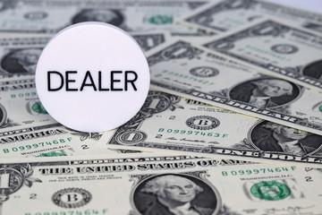 Dealer - many dollar bills