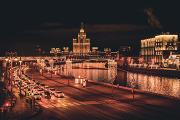 Obraz premium Wide angle view traffic in the city of Moscow at night. Travel destination Moscow, Russia