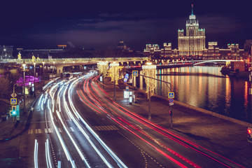 Fototapeta na wymiar Wide angle view traffic in the city of Moscow at night. Travel destination Moscow, Russia