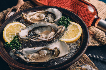 Fresh oysters with lemon ice and white wine.