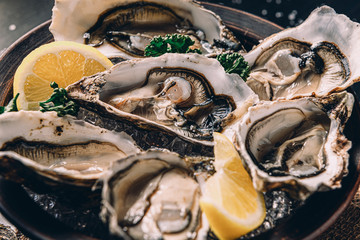 Fresh oysters with lemon ice and white wine.