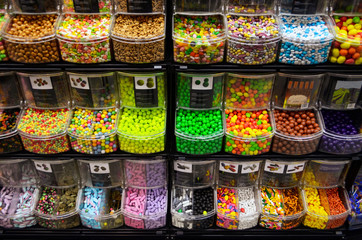 boxes with colorful candies in a candy shop