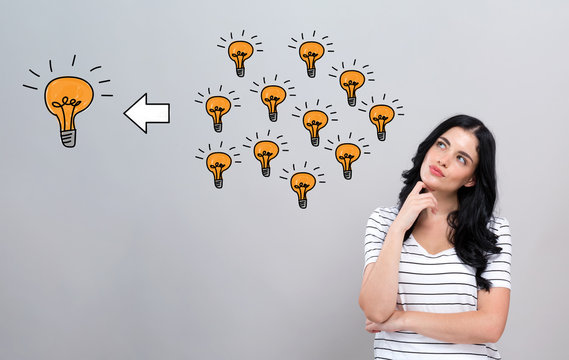 Many small ideas into one big idea with young woman in a thoughtful face