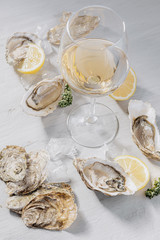 Fresh oysters with lemon ice and white wine.
