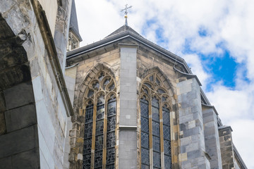 Detail of large vintage Gothic windows and walls with buttresses of city church of St, Nicolas in...