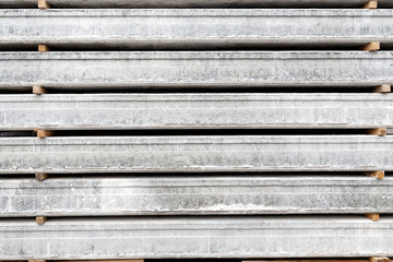 Background texture of stack of Prefabricated concrete slabs for construction.