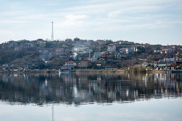 Fototapeta premium the city reflected in the water