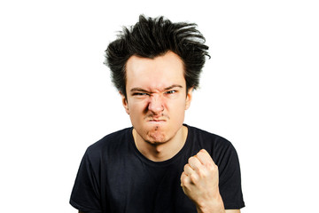 Young aggressive white caucasian guy threatening fists on white isolated background