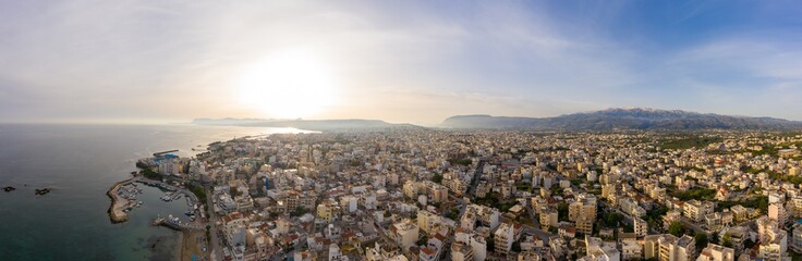 Panoramic aerial view from above of the city of Chania, Crete island, Greece. Landmarks of Greece, beautiful venetian town Chania in Crete island. Chania, Crete, Greece.