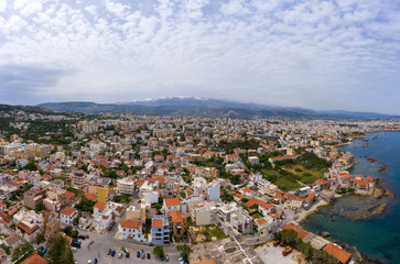 Panoramic aerial view from above of the city of Chania, Crete island, Greece. Landmarks of Greece, beautiful venetian town Chania in Crete island. Chania, Crete, Greece.
