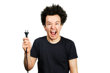 long hair guy holds an electric plug with a cable in his hand on a white isolated background