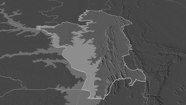 Oti, region with its capital, zoomed and extruded on the bilevel map of Ghana in the conformal Stereographic projection. Animation 3D