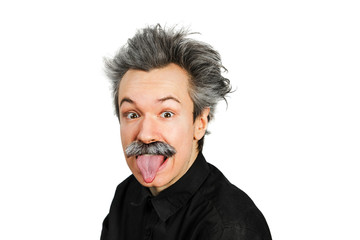 Portrait of jocular aging man with grey long hair sticking his tongue out in Einstein manner....