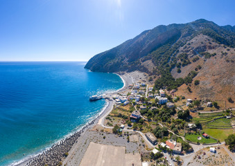 Aerial panoramic shot of Agia Roumeli beach in Chania of Crete, Greece. The village of Agia Roumeli...