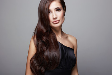 Fototapeta premium Beautiful Hair Smiling Girl. beautiful woman with Healthy Hair