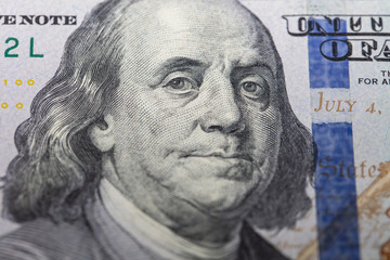 Obraz na płótnie Canvas fragment of 100 dollar bill
