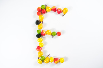 eat vitamins letter clsoeup fruits vegetables represent symbol health happy life