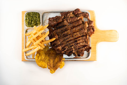 grill Beaf steack on wooden tray, white background