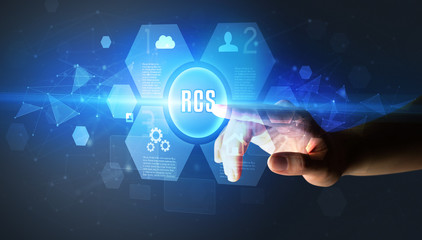 Hand touching RCS inscription, new technology concept