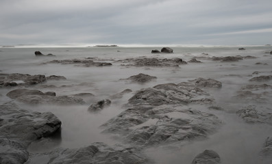 Rocks cover by the water with hide tide
