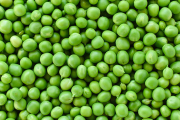 Green pea. Background for postcards. Green background and peas.