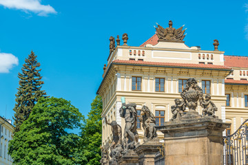 View of the top of old buildings with red roof and blue sky at Prague city Czech republic.