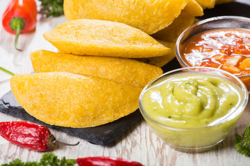 Empanadas with hot sauce, traditional Colombian food