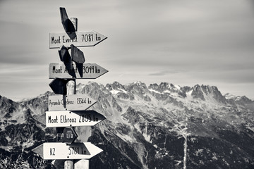 Pointers to the highest mountains in the world.  Alps, France.